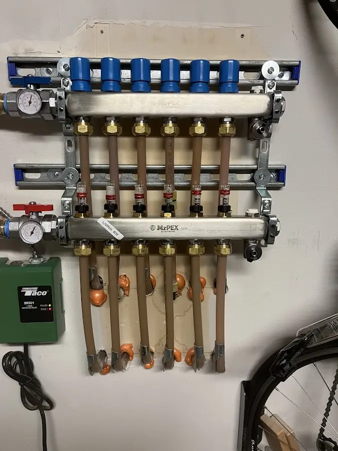 Plumber performing Gas Line Installation at a residential property in Bowne